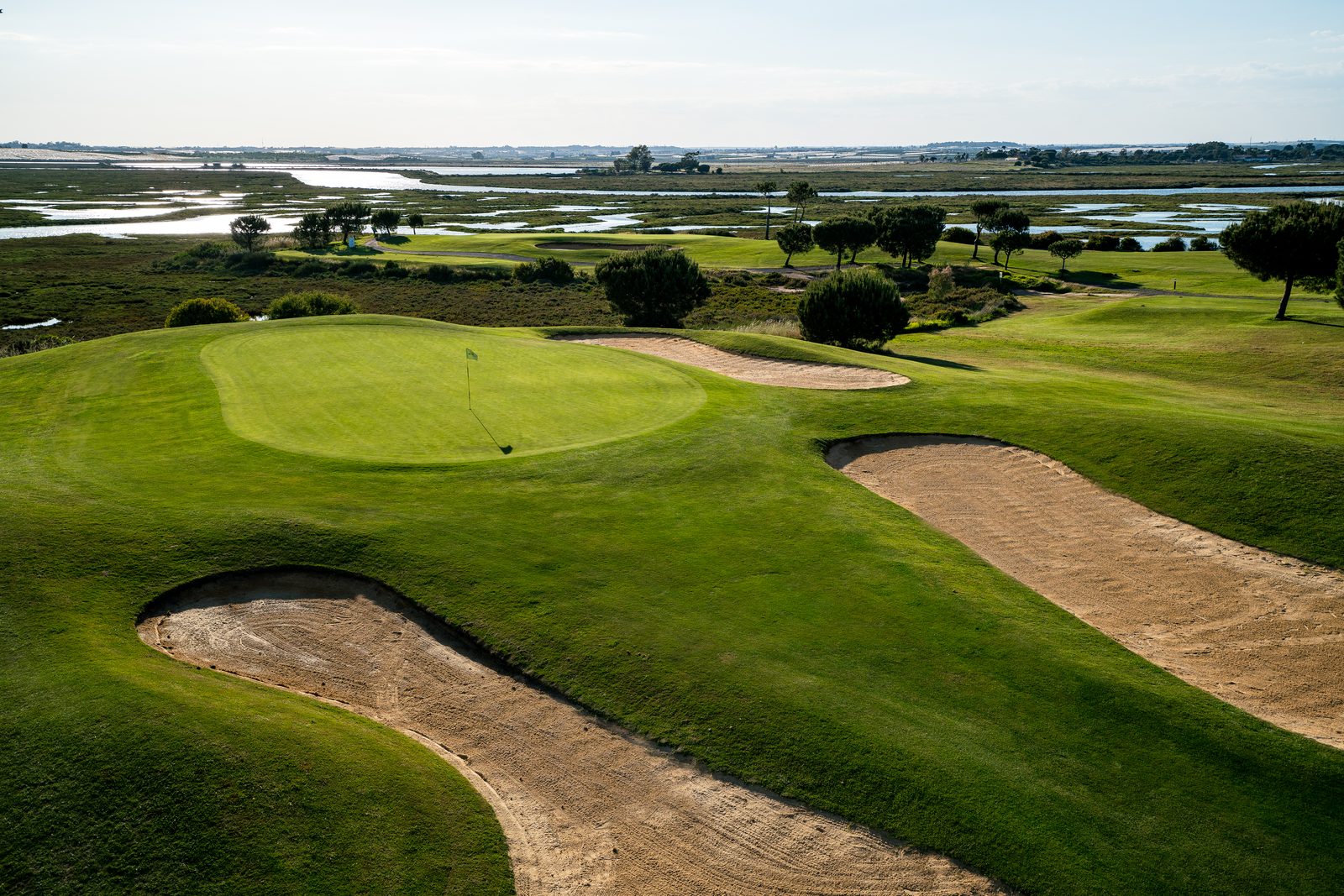 El Rompido golf course green, overlooking the marshlands